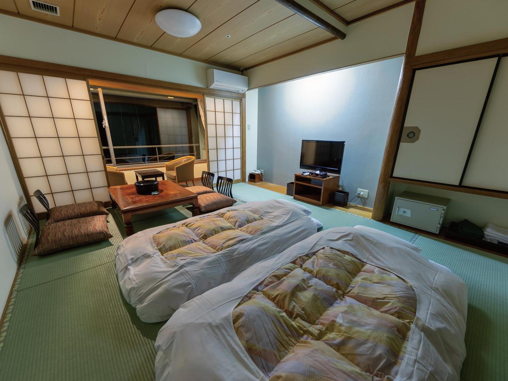 34m² studio Appartement, met 1 privé badkamer in Higashiizu Kamer foto